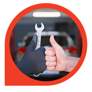 technician and customer thumbs up with wrench